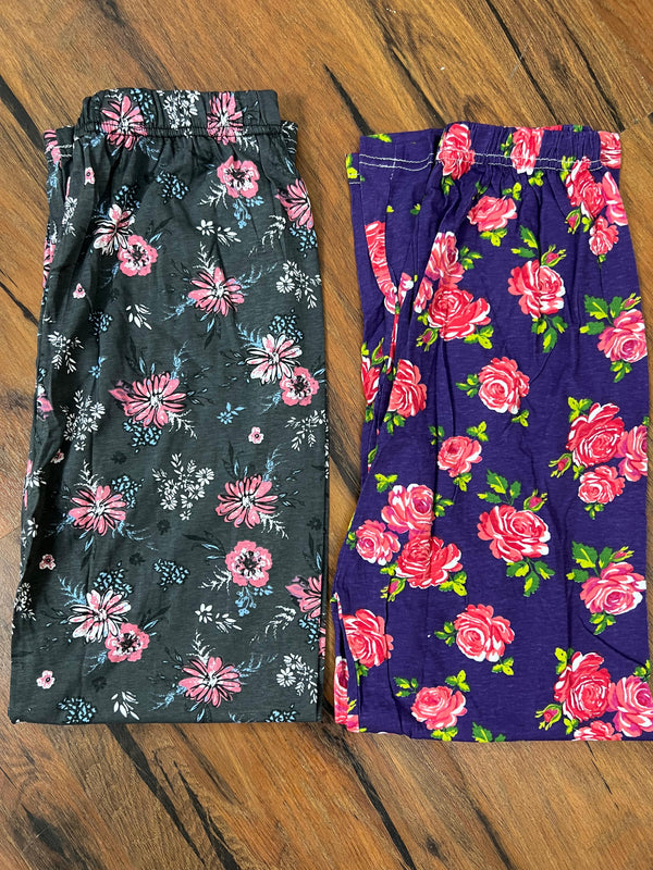 Pack of two cotton jersey trousers (blue flowers - black flowers)